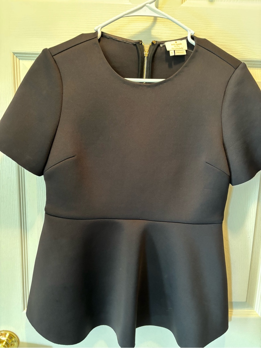kate spade black peplum short sleeve top with gold zipper sz small